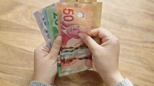 العائلات الكندية ستوفّر حوالي 280 دولاراً في 2026